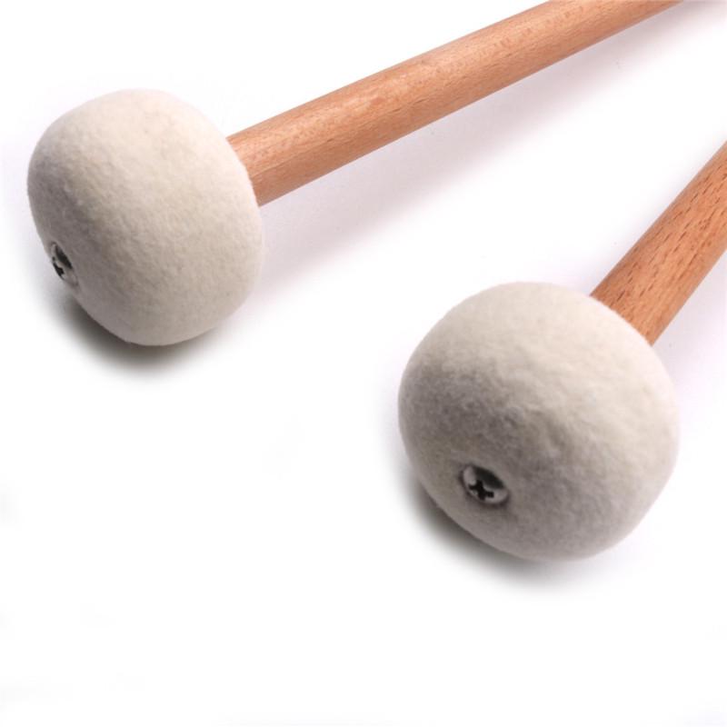 2 vnt. Timpani malotė, būgno lazdelė, veltinio galvutė, medinė rankena, neslystančios bosinio būgno lazdelės, nepakeičiamos