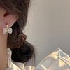 Korean version of light luxury bow zircon earrings women's niche unique design high-end sense super fairy versatile temperament stud earrings