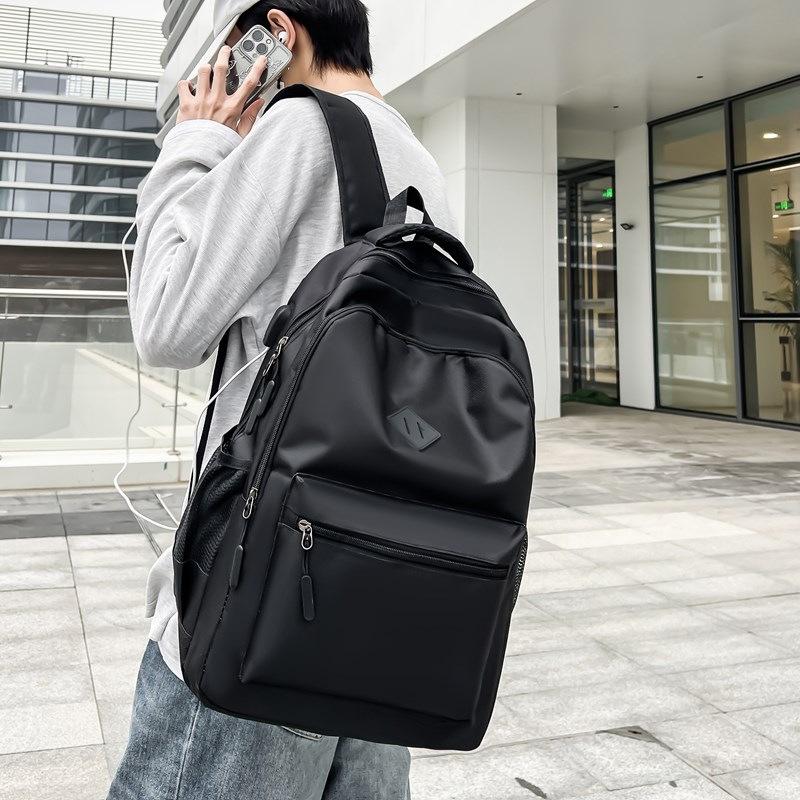 Schoolbag Wholesale Fashion Nylon Backpack 1011 New Simple Large Capacity Burden Reduction Student School Bag Business USB Backpack