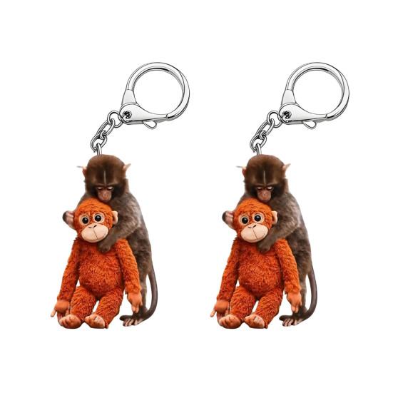 2 Stück Schlüsselanhänger Schlagender Affe Anhänger Schlüsselanhänger Verschleißfest Tasche Rucksack Autoschlüssel Foto Requisite