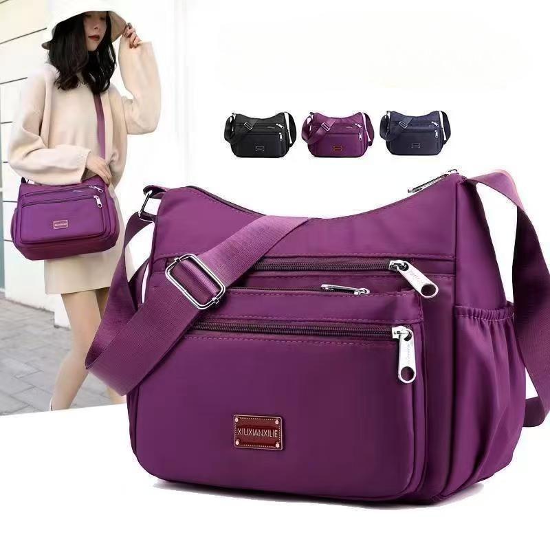 Women's Large Capacity Shoulder Bag Nylon Canvas Bag Waterproof and Wear Resistant Multi Pocket Commuter Leisure Outdoor Crossbody Bag