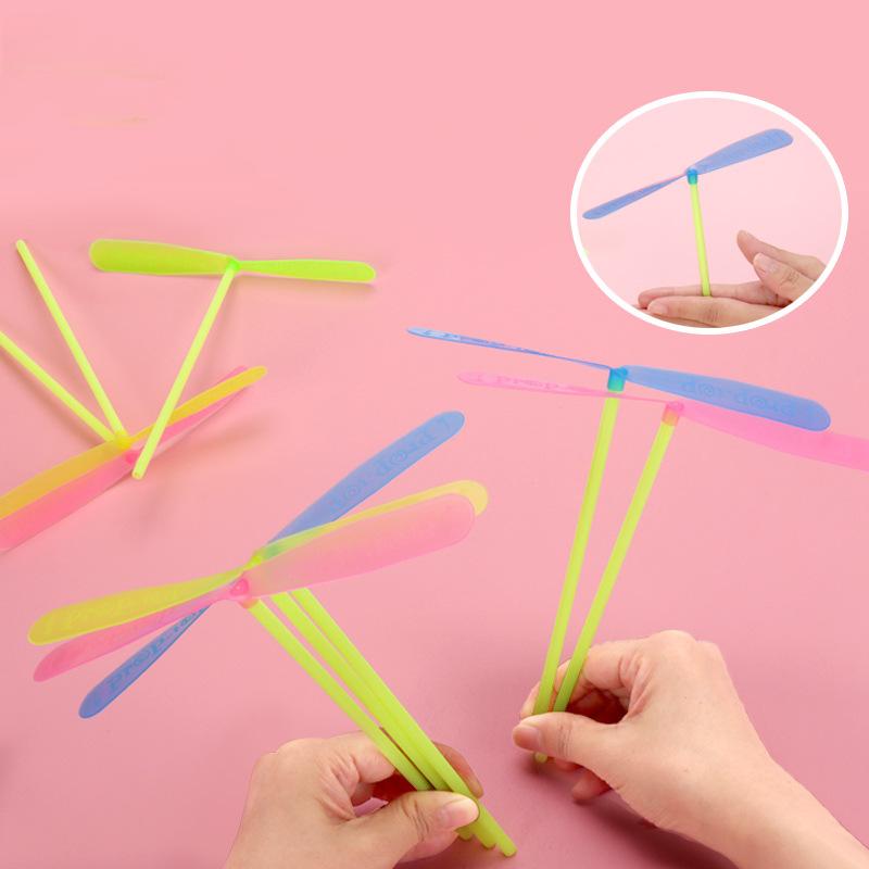 Classic traditional plastic bamboo dragonfly hand push PaddlePaddle outdoor sports game children's educational rotary toys