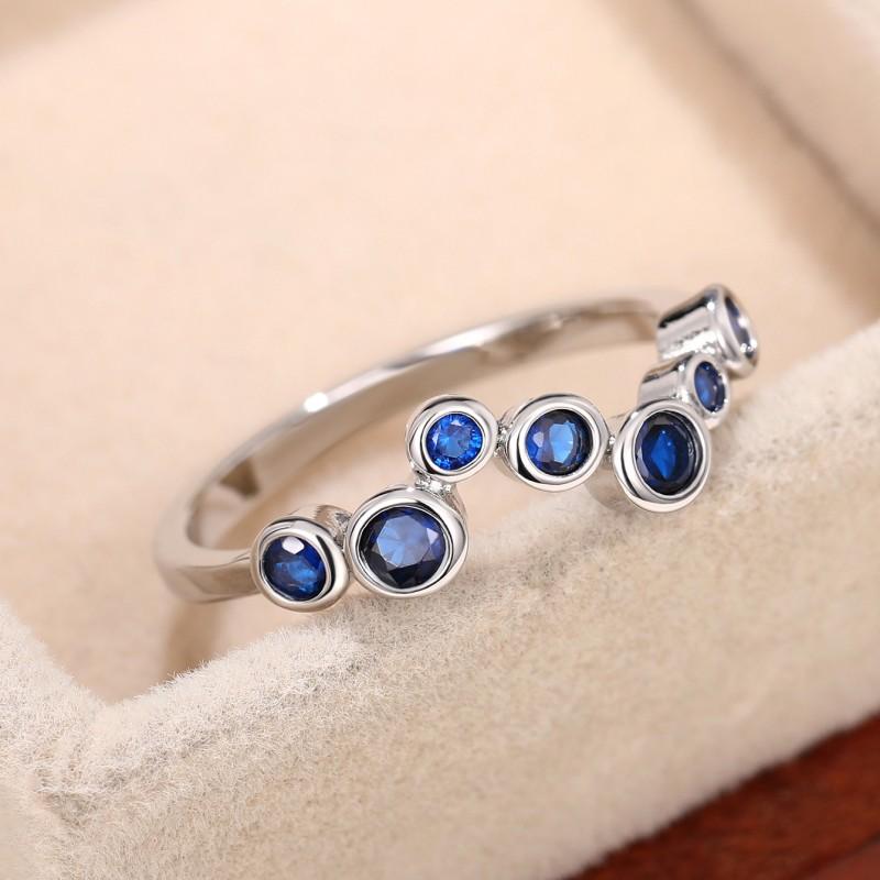 Huitan Bague Fantaisie Forme Irrégulière Zircone Cubique Bleu pour Femme Tempérament Feminin Accessoires de Doigt Usage Quotidien Bijoux Élégants